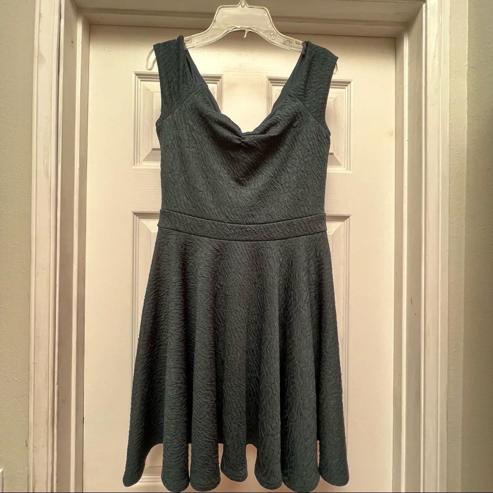 Bebe fit and flare dress color deep green. Size medium petite. Great for fall.